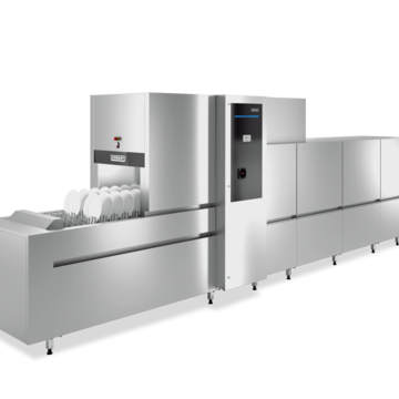 Una lavastoviglie a nastro HOBART FLOW LINE in acciaio inox, mostrata in vista frontale angolata, con una sezione di ingresso per il carico, un modulo di controllo centrale e diverse zone chiuse di lavaggio e asciugatura progettate per processi di lavaggio automatici ad alta capacità.